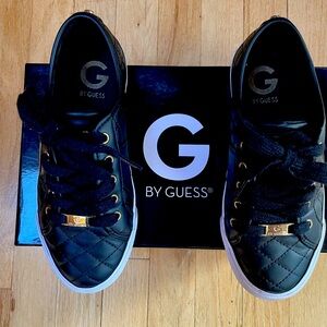 Guess black sneakers with laces in excellent condition.